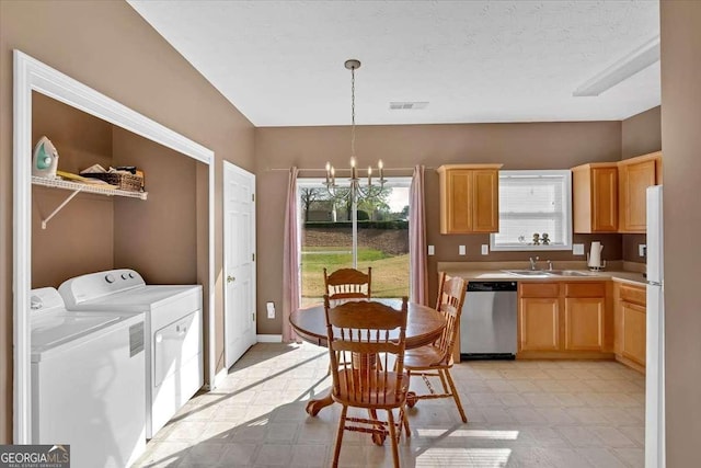 200 Arrowhead Ln, Canton, GA 30114 - kitchen with an inviting chandelier, stainless steel dishwasher, washer and dryer, a sink, and light brown cabinetry