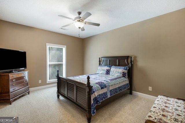 bedroom with carpet, baseboards, and ceiling fan