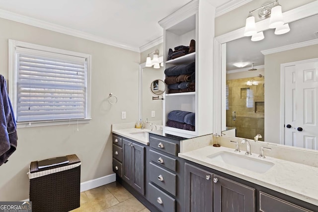 bathroom featuring a sink, a stall shower, and crown molding