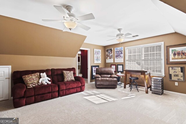 living area featuring carpet flooring, ceiling fan, baseboards, and lofted ceiling