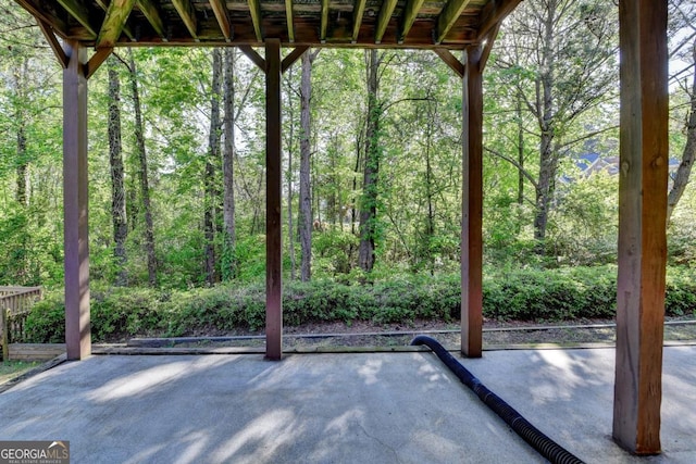 1806 Royal Troon Ct, Duluth, GA 30097 - view of patio with a wooded view