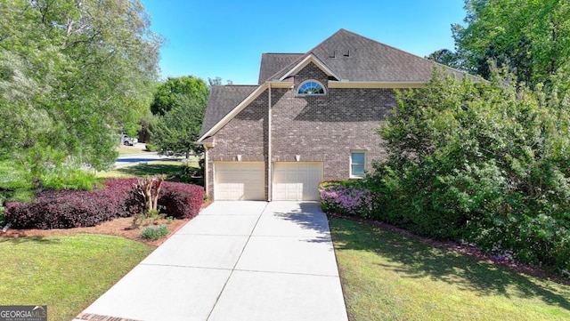 1806 Royal Troon Ct, Duluth, GA 30097 - view of side of home featuring brick siding, driveway, a garage, a yard, and roof with shingles