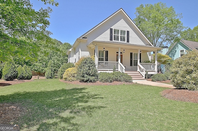 bungalow-style house with a porch and a front lawn