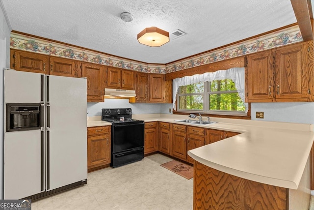 1070 Lovers Lane Rd SE, Calhoun, GA 30701 - kitchen with white fridge with ice dispenser, black range with electric cooktop, under cabinet range hood, a sink, and light flooring