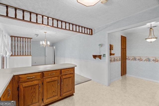 1070 Lovers Lane Rd SE, Calhoun, GA 30701 - kitchen with brown cabinets, light flooring, a textured ceiling, and pendant lighting