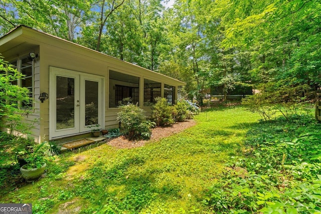 1070 Lovers Lane Rd SE, Calhoun, GA 30701 - view of grassy yard with french doors