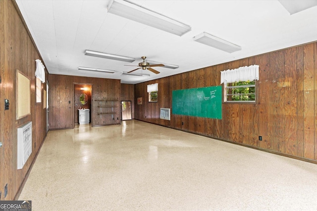1070 Lovers Lane Rd SE, Calhoun, GA 30701 - unfurnished room featuring wooden walls, baseboards, and a ceiling fan