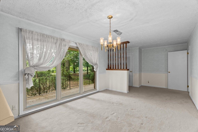 1070 Lovers Lane Rd SE, Calhoun, GA 30701 - unfurnished dining area with a chandelier, a textured ceiling, and carpet flooring