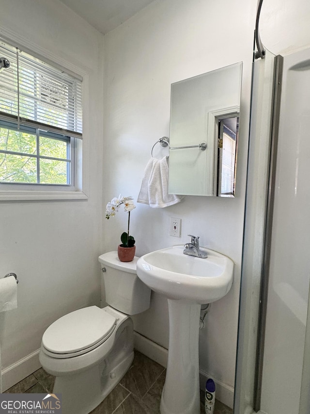 6718 Delta Dr, Riverdale, GA 30274 - half bathroom with baseboards and toilet