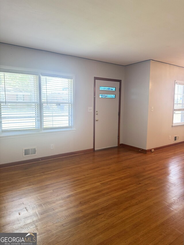 6718 Delta Dr, Riverdale, GA 30274 - foyer entrance with visible vents and baseboards