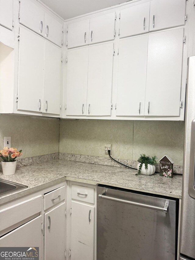 6718 Delta Dr, Riverdale, GA 30274 - kitchen featuring light countertops, white cabinetry, and stainless steel appliances