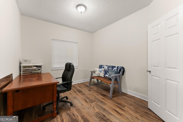 791 Thornwood Cir, Mount Airy, GA 30563 - home office featuring wood finished floors, a textured ceiling, and baseboards