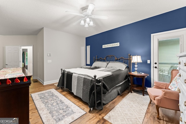 791 Thornwood Cir, Mount Airy, GA 30563 - bedroom featuring wood finished floors, ceiling fan, baseboards, and a textured ceiling