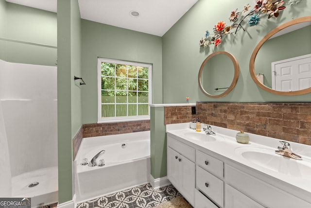 791 Thornwood Cir, Mount Airy, GA 30563 - bathroom with double vanity, a garden tub, a wainscoted wall, a shower, and tile patterned floors