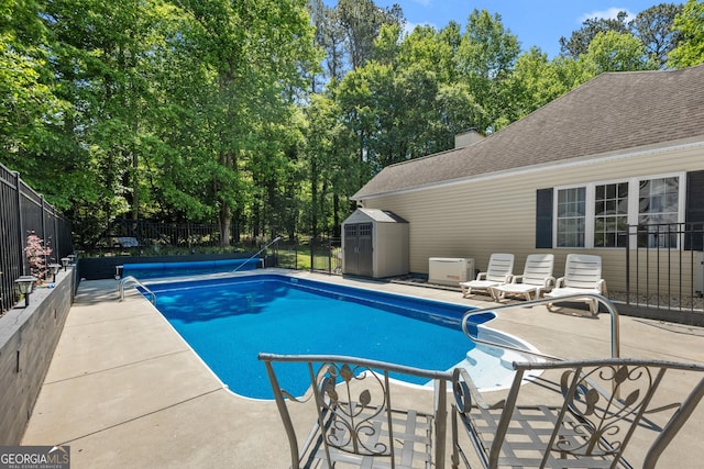 791 Thornwood Cir, Mount Airy, GA 30563 - wooden terrace featuring a storage unit, an outdoor structure, and outdoor dining area