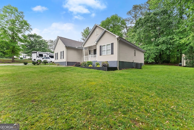 791 Thornwood Cir, Mount Airy, GA 30563 - view of side of property with a lawn and central AC unit