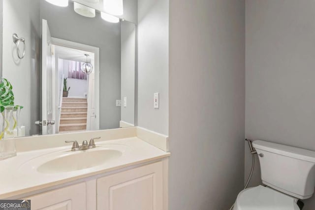745 Abbotts Mill Ct, Duluth, GA 30097 - half bathroom featuring toilet and vanity