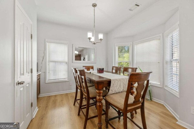 745 Abbotts Mill Ct, Duluth, GA 30097 - dining area with a chandelier, visible vents, light wood-type flooring, and baseboards