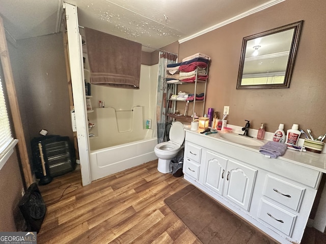 3002 24th Ave, Valley, AL 36854 - full bath featuring wood finished floors, vanity, toilet, shower / tub combo with curtain, and crown molding