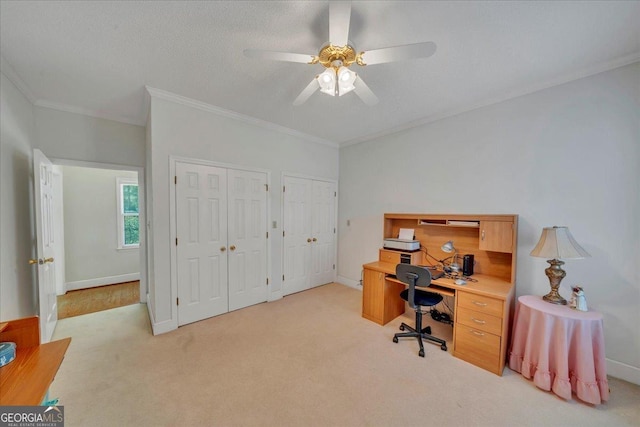 485 Fussell Rd, Leesburg, GA 31763 - home office with ornamental molding, ceiling fan, light carpet, and baseboards