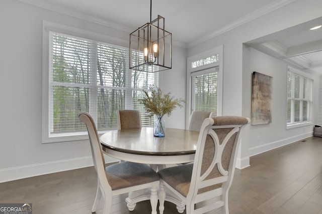 123 Townsend Pass, Alpharetta, GA 30004 - dining room with a chandelier, crown molding, and wood finished floors