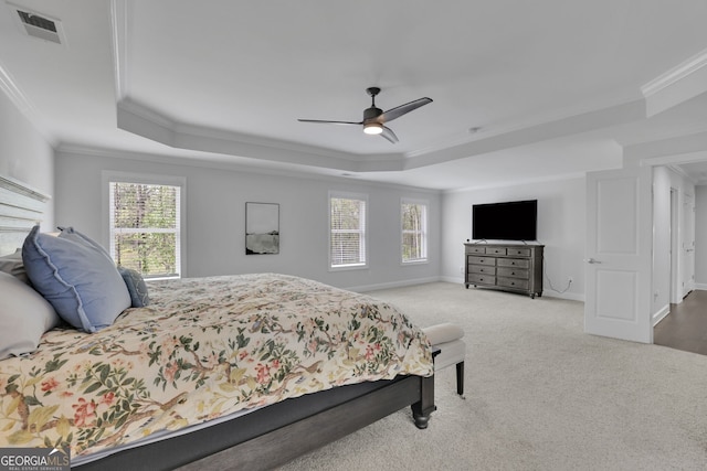 123 Townsend Pass, Alpharetta, GA 30004 - bedroom featuring a tray ceiling, crown molding, carpet floors, and a ceiling fan