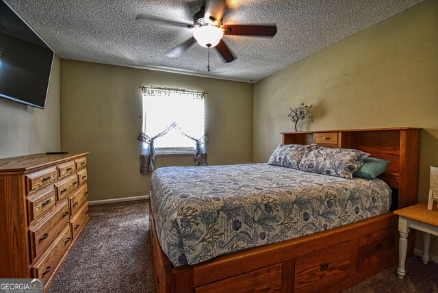 carpeted bedroom with a textured ceiling, baseboards, and a ceiling fan