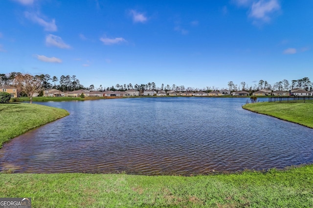 view of water feature with a residential view