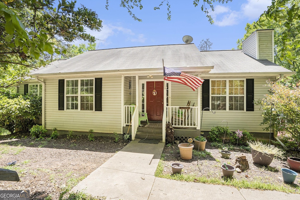 view of front of home with a chimney