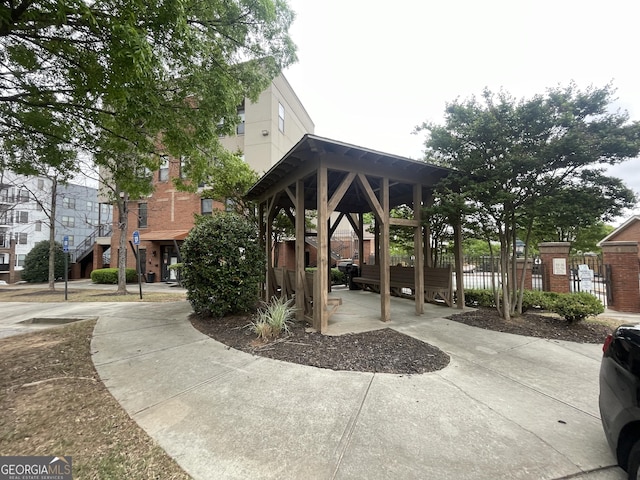 view of property's community with fence