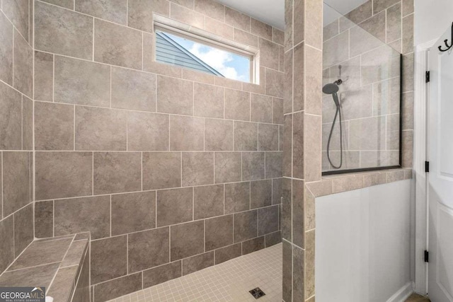 bathroom with a walk in shower