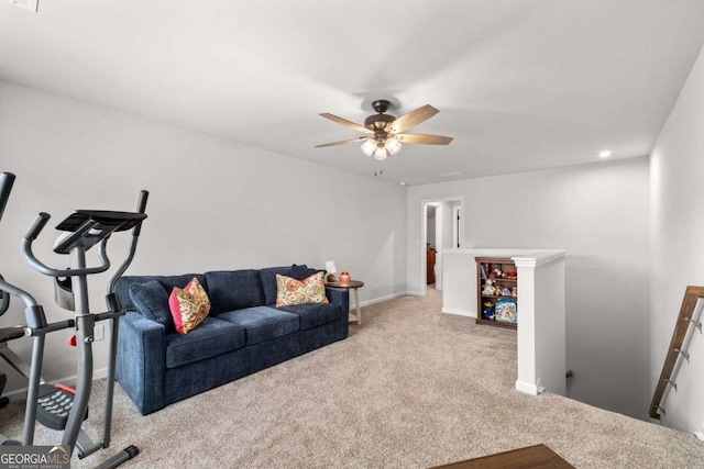 living room with carpet floors, ceiling fan, recessed lighting, and baseboards