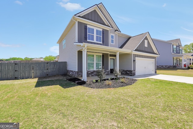 craftsman-style home with board and batten siding, a porch, stone siding, and concrete driveway