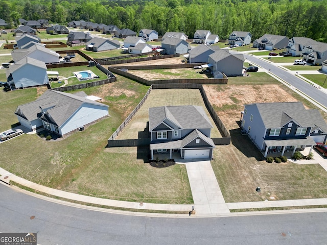 aerial view with a view of trees and a residential view