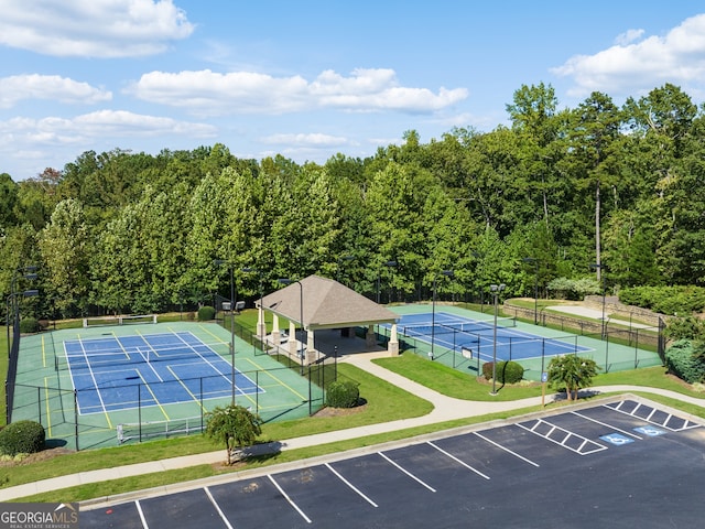 birds eye view of property with a forest view