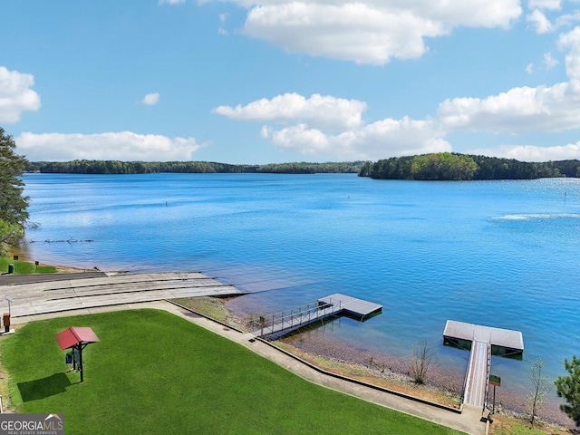 dock area featuring a water view