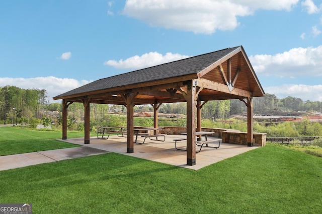 view of home's community featuring a yard, a gazebo, and a patio area