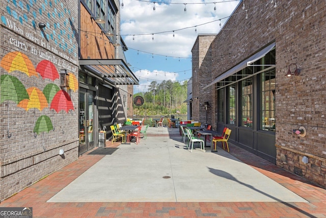 view of patio featuring outdoor dining area