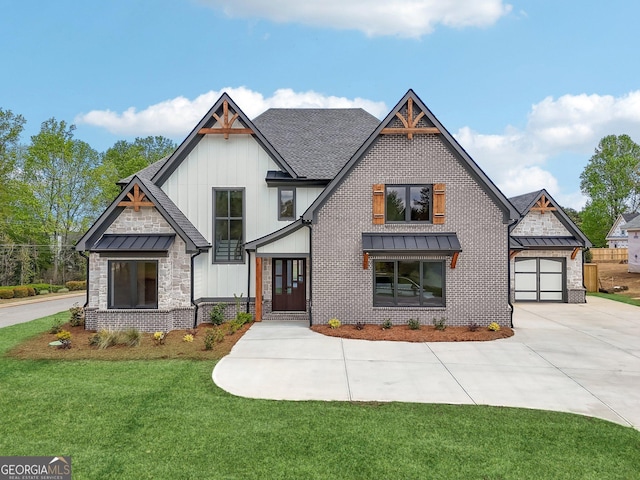 modern farmhouse style home featuring a standing seam roof, concrete driveway, stone siding, and a front lawn