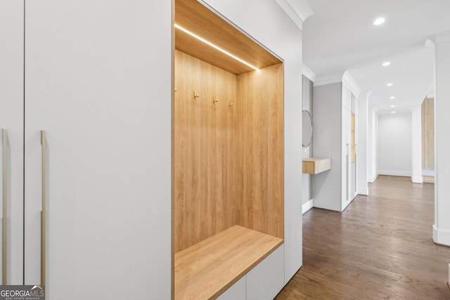 mudroom with recessed lighting, baseboards, crown molding, and wood finished floors