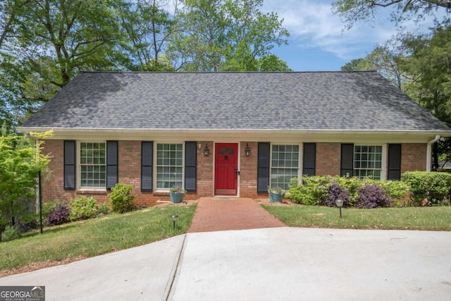 378 Beechwood Dr, Athens, GA 30606 - ranch-style house with roof with shingles, a front yard, and brick siding