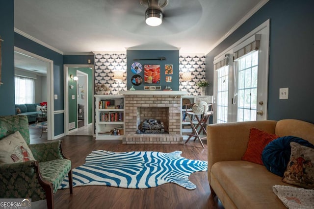 378 Beechwood Dr, Athens, GA 30606 - living room with a fireplace, a ceiling fan, crown molding, and wood finished floors