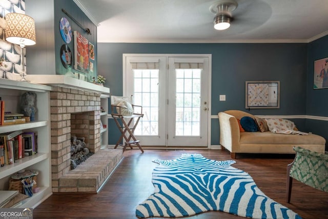 378 Beechwood Dr, Athens, GA 30606 - living area featuring a brick fireplace, baseboards, crown molding, and wood finished floors