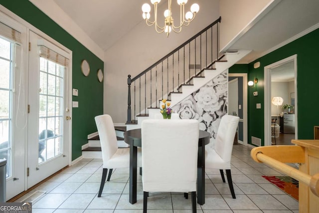 378 Beechwood Dr, Athens, GA 30606 - tiled dining area with a chandelier, baseboards, visible vents, and stairway