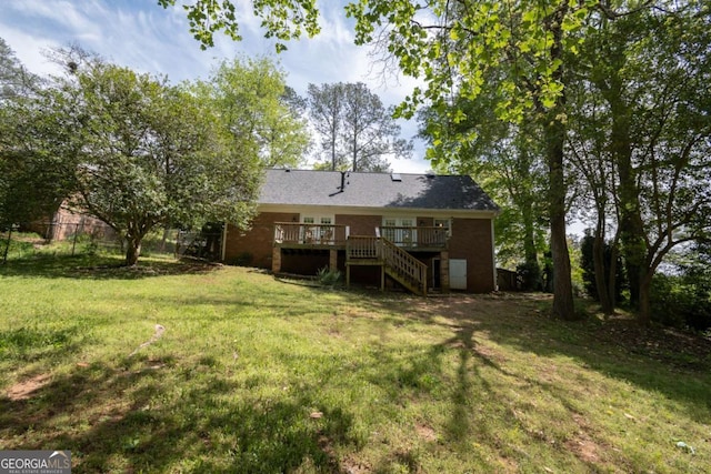 378 Beechwood Dr, Athens, GA 30606 - back of property featuring a yard, fence, a deck, and stairway