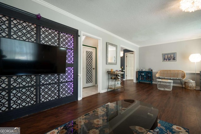 378 Beechwood Dr, Athens, GA 30606 - living room with ornamental molding, baseboards, wood finished floors, and a textured ceiling