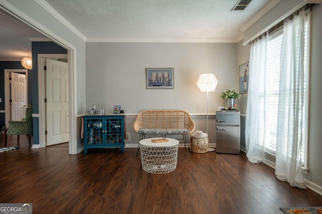 378 Beechwood Dr, Athens, GA 30606 - sitting room featuring visible vents, baseboards, ornamental molding, a textured ceiling, and wood finished floors