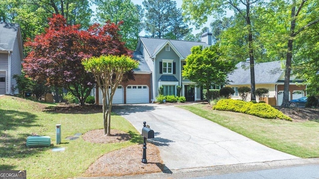 traditional-style house with a front lawn, aphalt driveway, and a chimney