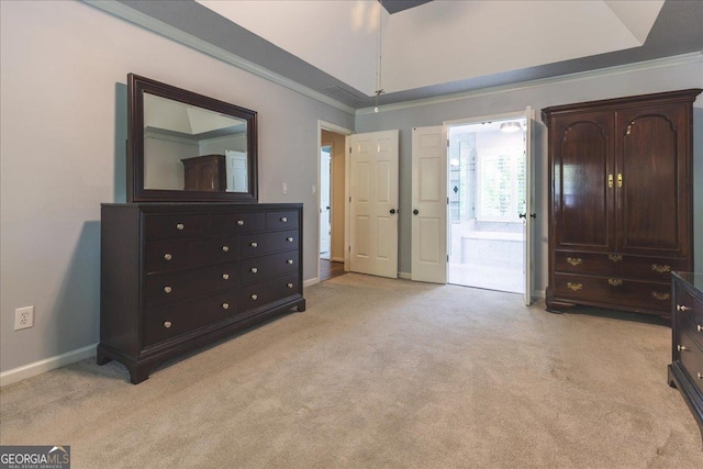 bedroom with light carpet, ornamental molding, ensuite bathroom, and baseboards