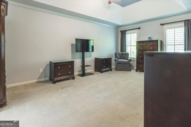 carpeted bedroom with baseboards and a ceiling fan